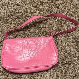 Pink crocodile shoulder bag